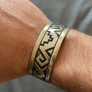 Men’s cuff bracelet with southwestern design.
